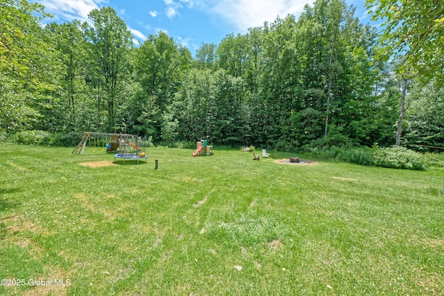 962 Camden Valley Rd, Salem, NY 12873 - view of grassy yard featuring a playground and a fire pit