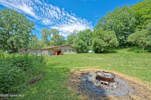 962 Camden Valley Rd, Salem, NY 12873 - view of grassy yard featuring a fire pit and view of scattered trees