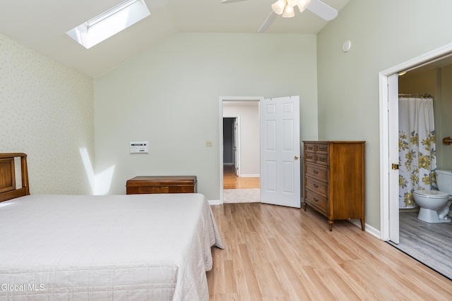 1 Maple Dr, Greenfield, NY 12833 - bedroom featuring a skylight, high vaulted ceiling, light wood finished floors, ensuite bathroom, and ceiling fan