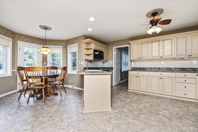 1 Maple Dr, Greenfield, NY 12833 - kitchen featuring cream cabinets, open shelves, black microwave, tasteful backsplash, and recessed lighting