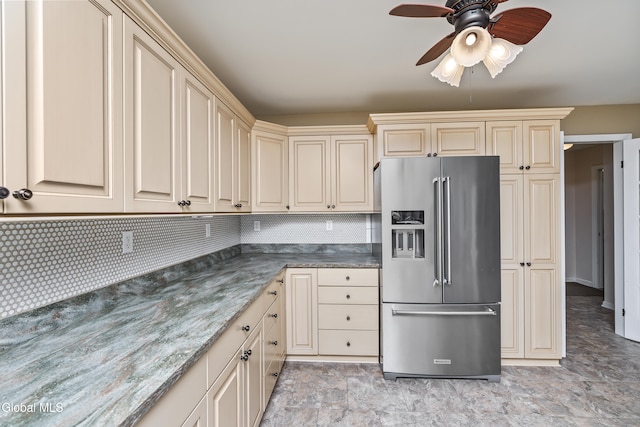 1 Maple Dr, Greenfield, NY 12833 - kitchen with high end fridge, cream cabinets, ceiling fan, tasteful backsplash, and stone finish flooring