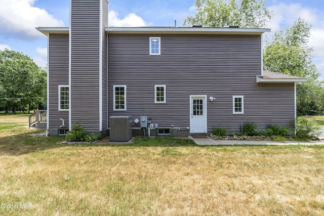 1 Maple Dr, Greenfield, NY 12833 - rear view of property with a lawn and a chimney