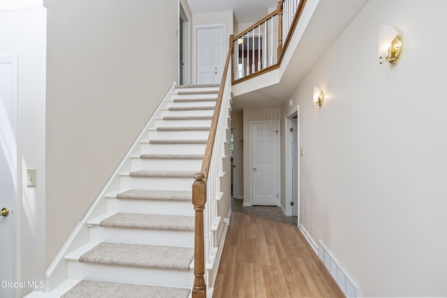 1 Maple Dr, Greenfield, NY 12833 - staircase with wood finished floors and a high ceiling