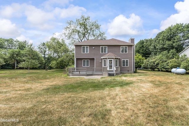 1 Maple Dr, Greenfield, NY 12833 - back of house with a chimney, a deck, and a lawn