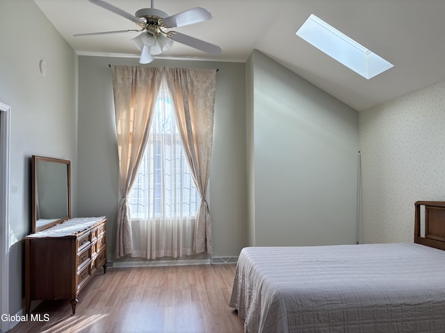 1 Maple Dr, Greenfield, NY 12833 - bedroom featuring light wood-style floors, a skylight, and ceiling fan