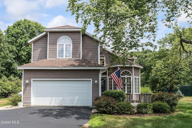 1 Maple Dr, Greenfield, NY 12833 - traditional-style home featuring an attached garage, asphalt driveway, and a shingled roof
