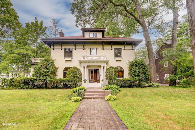 1171 Lowell Rd, Schenectady, NY 12308 - italianate house with stucco siding, a chimney, and a front lawn