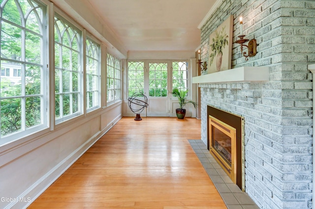 1171 Lowell Rd, Schenectady, NY 12308 - unfurnished sunroom with wood finished floors