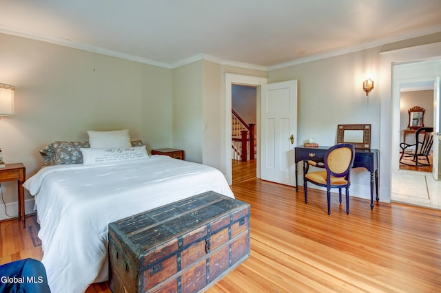 1171 Lowell Rd, Schenectady, NY 12308 - bedroom featuring light wood finished floors and crown molding
