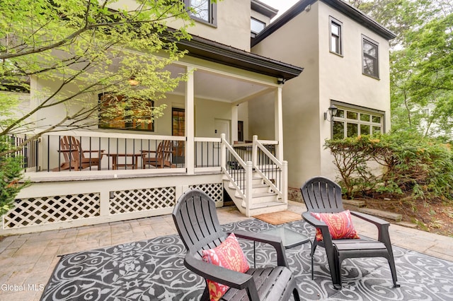 1171 Lowell Rd, Schenectady, NY 12308 - covered porch featuring a patio area