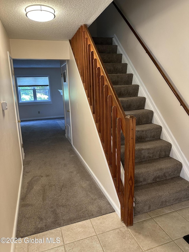11 Derby Dr, Saratoga Springs, NY 12866 - stairs featuring a textured ceiling and carpet flooring