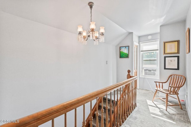 236 Cherry St, Schenectady, NY 12306 - corridor featuring an upstairs landing, a chandelier, light carpet, cooling unit, and lofted ceiling