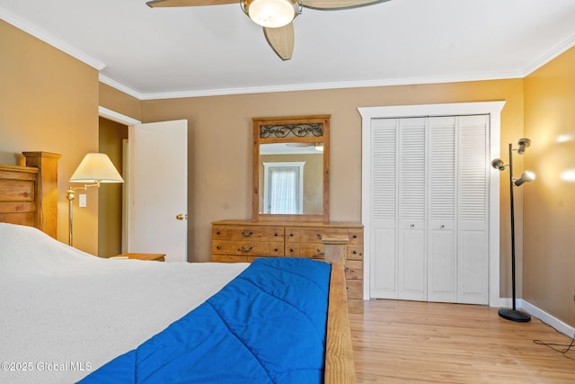 1927 Berne Altamont Rd, Altamont, NY 12009 - bedroom featuring wood finished floors, ornamental molding, ceiling fan, and a closet