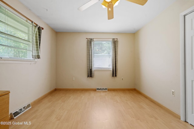 1927 Berne Altamont Rd, Altamont, NY 12009 - empty room featuring light wood finished floors, healthy amount of natural light, and ceiling fan