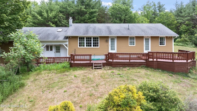 1927 Berne Altamont Rd, Altamont, NY 12009 - back of property with a chimney, a deck, and a shingled roof