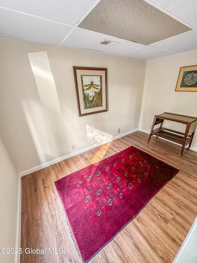 4882 Potter Hollow Rd, Rensselaerville, NY 12469 - sitting room with wood finished floors and a drop ceiling