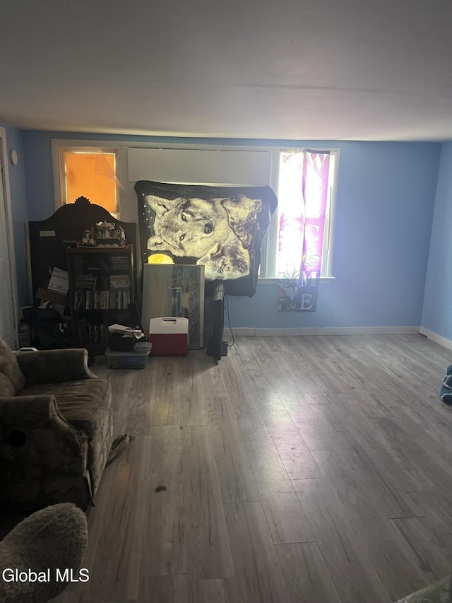 527 2nd St, Troy, NY 12180 - living area with wood finished floors and baseboards
