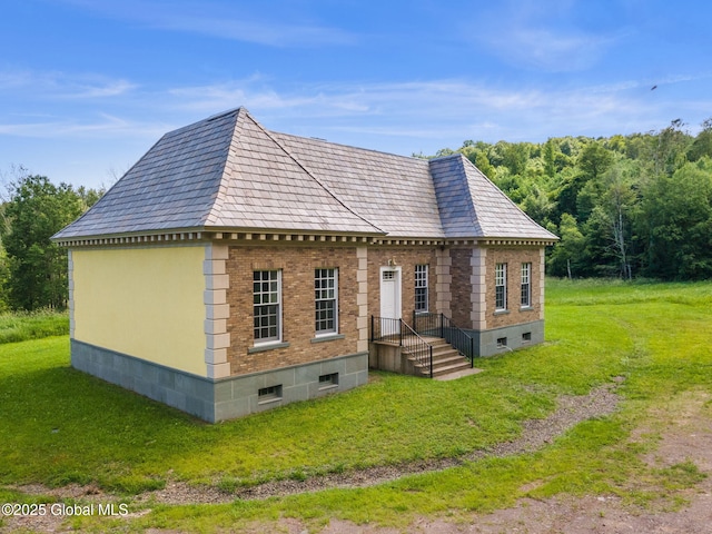 410 Jones Hill Rd, Jefferson, NY 12093 - view of front facade with a front lawn and brick siding