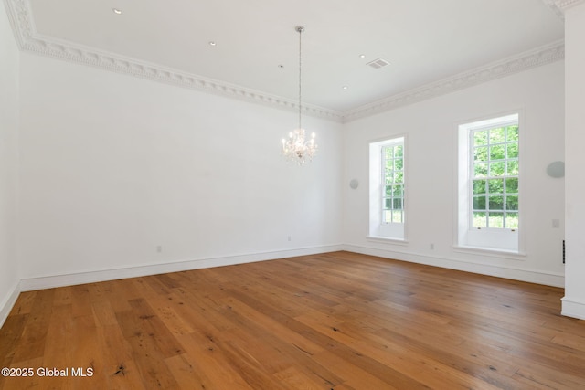 410 Jones Hill Rd, Jefferson, NY 12093 - spare room with ornamental molding, a chandelier, and light wood finished floors