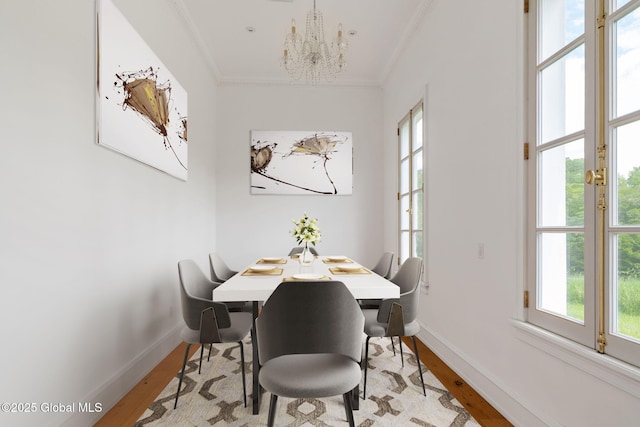 410 Jones Hill Rd, Jefferson, NY 12093 - dining area featuring plenty of natural light, a chandelier, light wood-type flooring, and crown molding