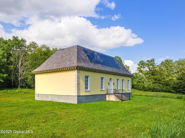 410 Jones Hill Rd, Jefferson, NY 12093 - view of property exterior with roof with shingles, a lawn, and mansard roof