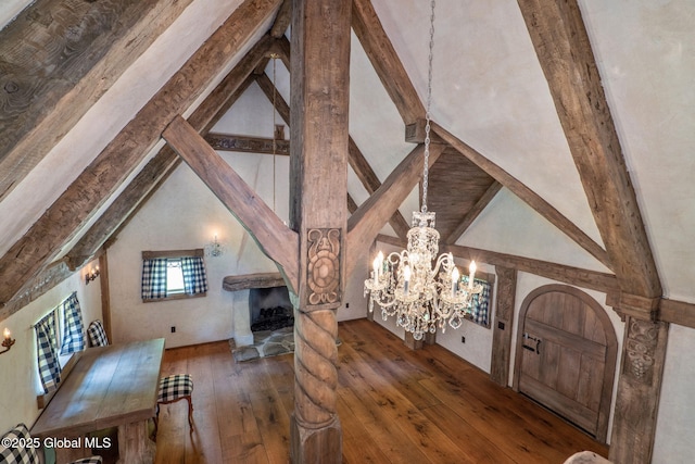 372 Jones Hill Rd, Jefferson, NY 12093 - interior space with hardwood / wood-style floors, a chandelier, and a fireplace with raised hearth