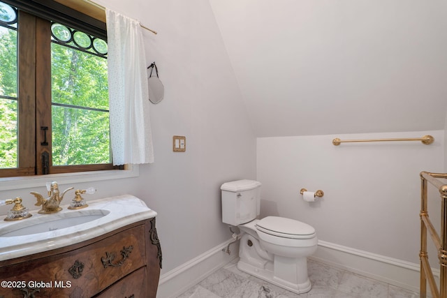372 Jones Hill Rd, Jefferson, NY 12093 - bathroom with vanity, marble finish floors, and lofted ceiling