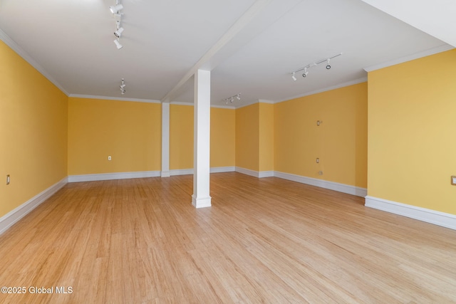 372 Jones Hill Rd, Jefferson, NY 12093 - spare room featuring track lighting, light wood-type flooring, and crown molding