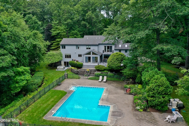 14 Friar Tuck Ct, Clifton Park, NY 12065 - rear view of property with a patio and a wooded view