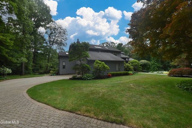 14 Friar Tuck Ct, Clifton Park, NY 12065 - view of side of property with curved driveway and a lawn