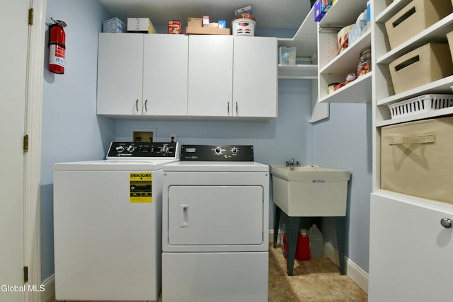 14 Friar Tuck Ct, Clifton Park, NY 12065 - laundry room featuring washing machine and clothes dryer and cabinet space