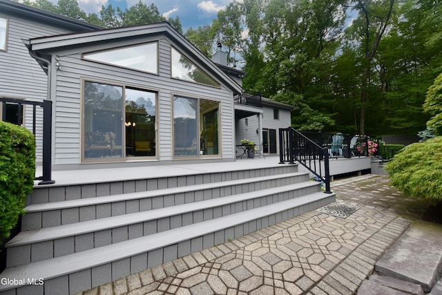 14 Friar Tuck Ct, Clifton Park, NY 12065 - view of property exterior with a chimney, a deck, and a patio