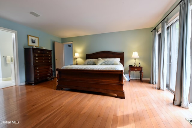 14 Friar Tuck Ct, Clifton Park, NY 12065 - bedroom featuring light wood-style flooring and baseboards