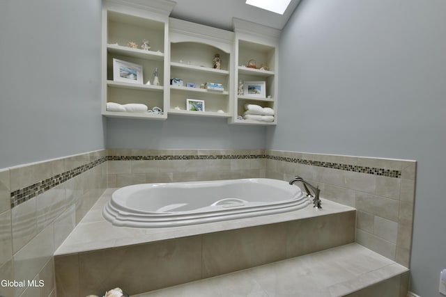 14 Friar Tuck Ct, Clifton Park, NY 12065 - bathroom featuring a bath and a skylight