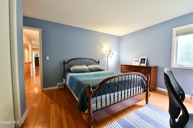 14 Friar Tuck Ct, Clifton Park, NY 12065 - bedroom with wood finished floors and baseboards