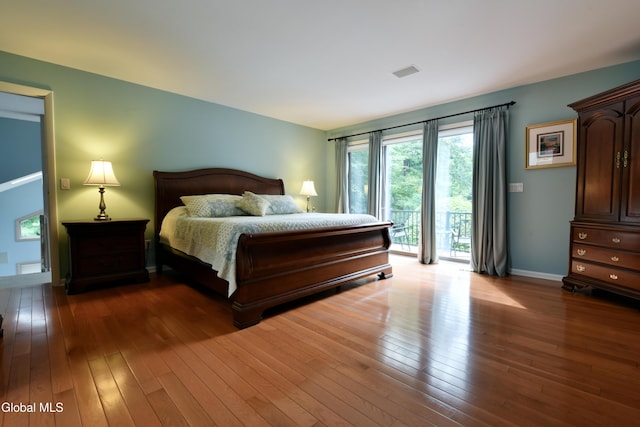 14 Friar Tuck Ct, Clifton Park, NY 12065 - bedroom with access to exterior and hardwood / wood-style flooring