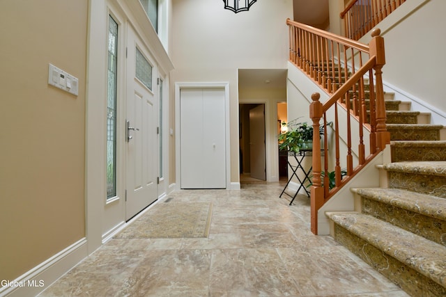 14 Friar Tuck Ct, Clifton Park, NY 12065 - entryway featuring a towering ceiling, plenty of natural light, and stairway
