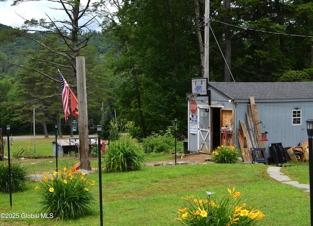6 Hollow Rd, Hadley, NY 12835 - view of grassy yard with an outbuilding