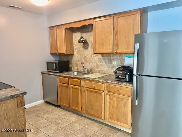 2059 Rosedale Way, Guilderland, NY 12303 - kitchen featuring stainless steel appliances, decorative backsplash, and light tile patterned floors