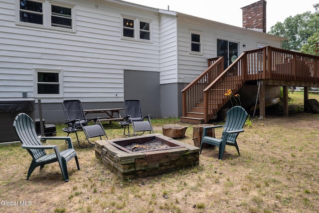 7 Shady Gln, Clifton Park, NY 12019 - rear view of house with a fire pit, a deck, stairs, a chimney, and a yard