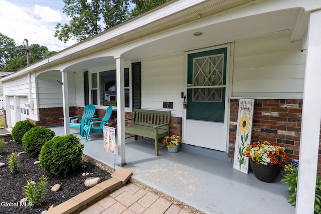 7 Shady Gln, Clifton Park, NY 12019 - property entrance with covered porch and brick siding