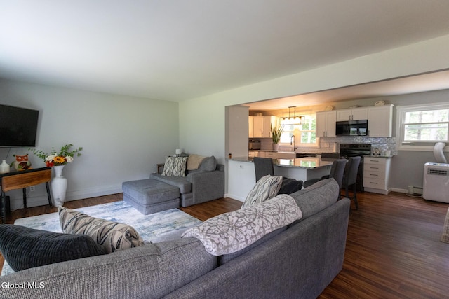 7 Shady Gln, Clifton Park, NY 12019 - living area with dark wood-style floors and baseboards