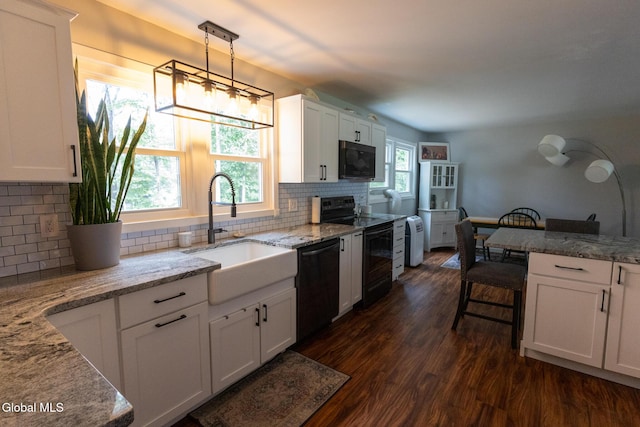 7 Shady Gln, Clifton Park, NY 12019 - kitchen with black appliances, white cabinetry, dark wood-style flooring, and tasteful backsplash