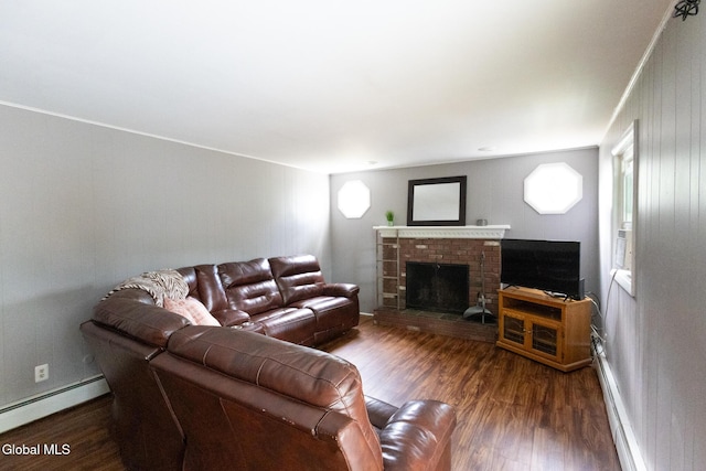 7 Shady Gln, Clifton Park, NY 12019 - living area with baseboard heating, wood finished floors, a fireplace, and healthy amount of natural light