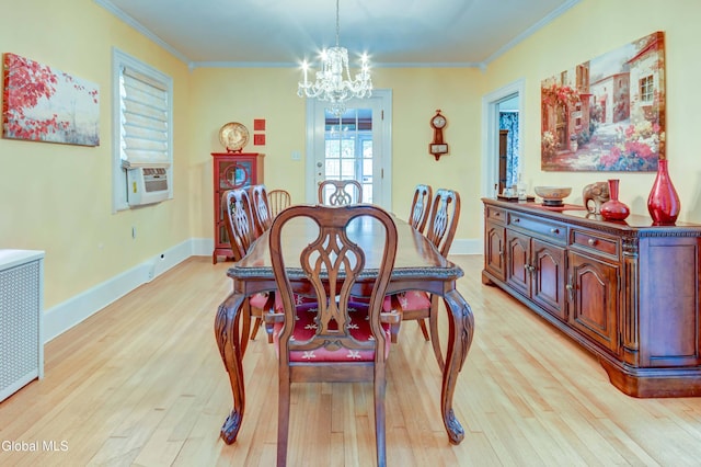 1151 Oxford Pl, Schenectady, NY 12308 - dining area with light wood-style flooring, a chandelier, crown molding, and radiator