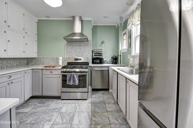 1151 Oxford Pl, Schenectady, NY 12308 - kitchen with wall chimney range hood, appliances with stainless steel finishes, crown molding, tasteful backsplash, and light countertops