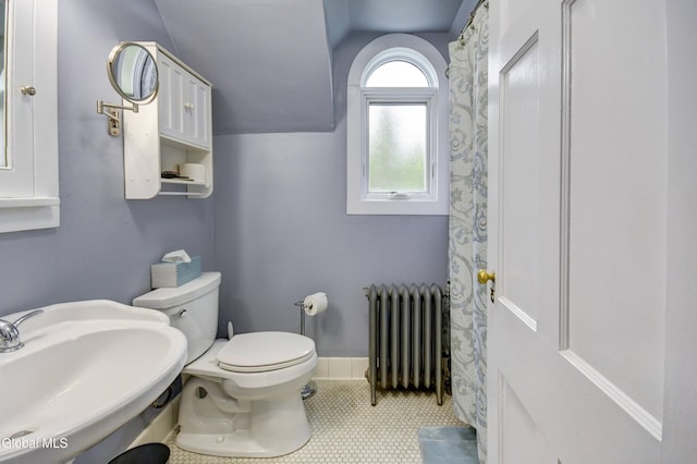 1151 Oxford Pl, Schenectady, NY 12308 - bathroom with radiator heating unit and tile patterned flooring