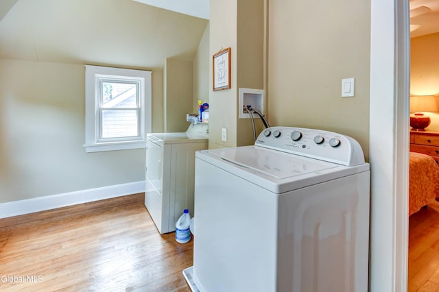 1151 Oxford Pl, Schenectady, NY 12308 - washroom with light wood finished floors and separate washer and dryer