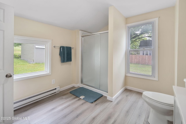 1707 Helderberg Trl, Berne, NY 12023 - full bath featuring a baseboard heating unit, wood finished floors, plenty of natural light, a stall shower, and lofted ceiling