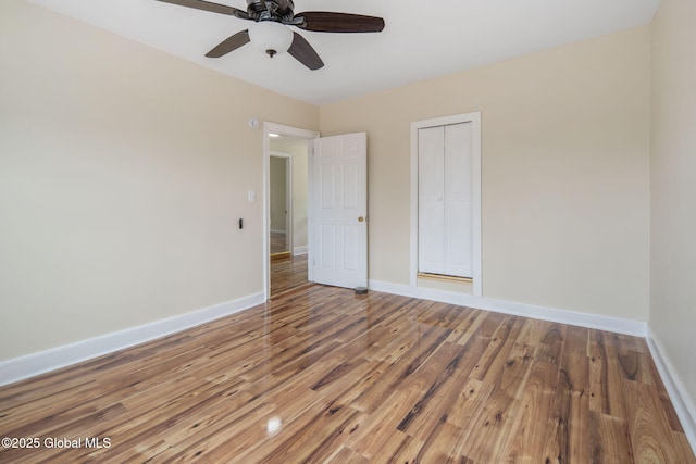 1707 Helderberg Trl, Berne, NY 12023 - unfurnished bedroom featuring wood finished floors, ceiling fan, and a closet